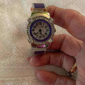 Purple Ladies Bracelet watch in silver. Great condition.